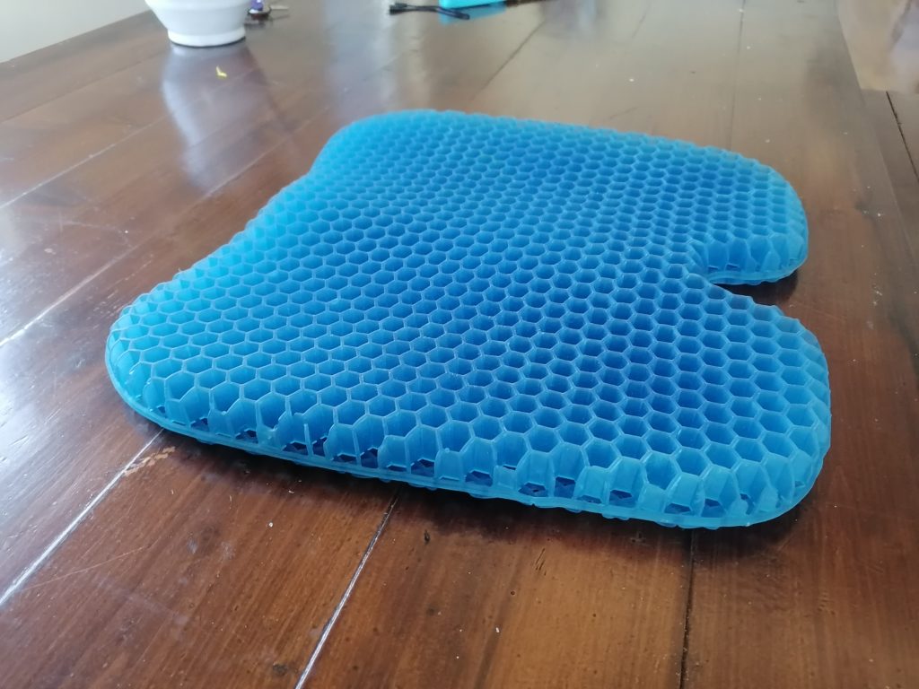 gel honeycomb seat cushion on a wooden chair