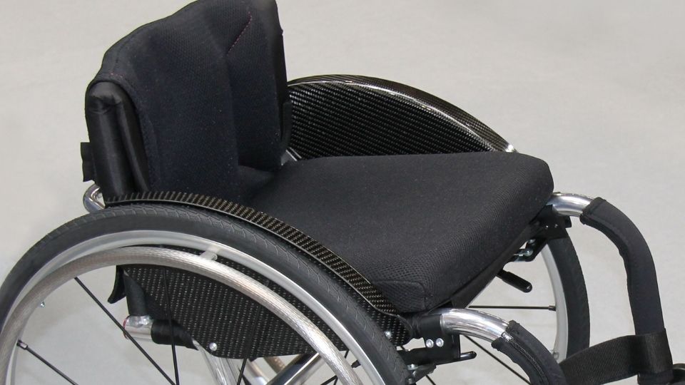 gel blader cushion on a black wheelchair
