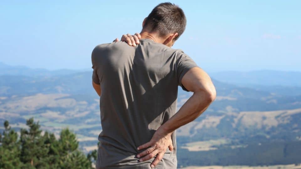 man upper back pain
